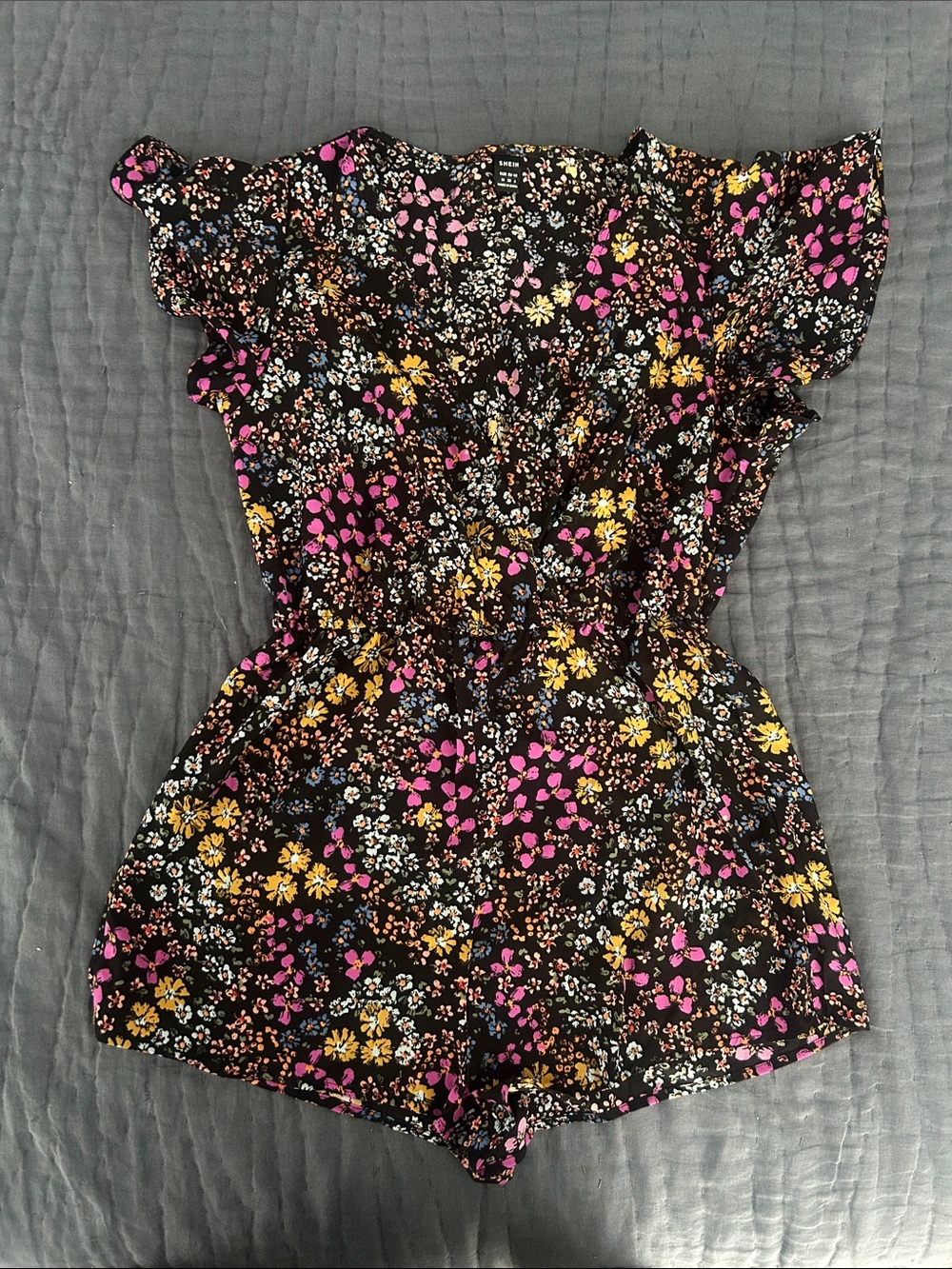 Black Floral Flutter-Sleeve Romper with Pink & Yellow Blooms